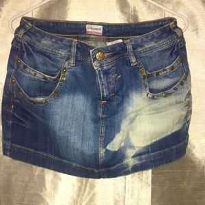 Distressed jean skirt.